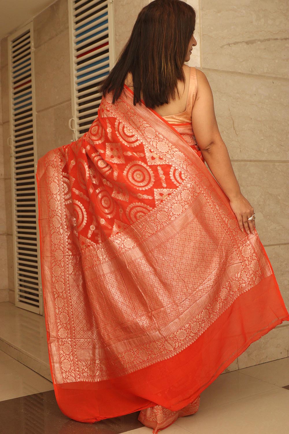 Elegant Orange Banarasi Handloom Pure Georgette Jaal Design Saree - Luxurion World