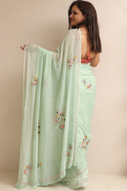 Sea Green Trendy Pure Georgette Sequins Work Saree - Luxurion World