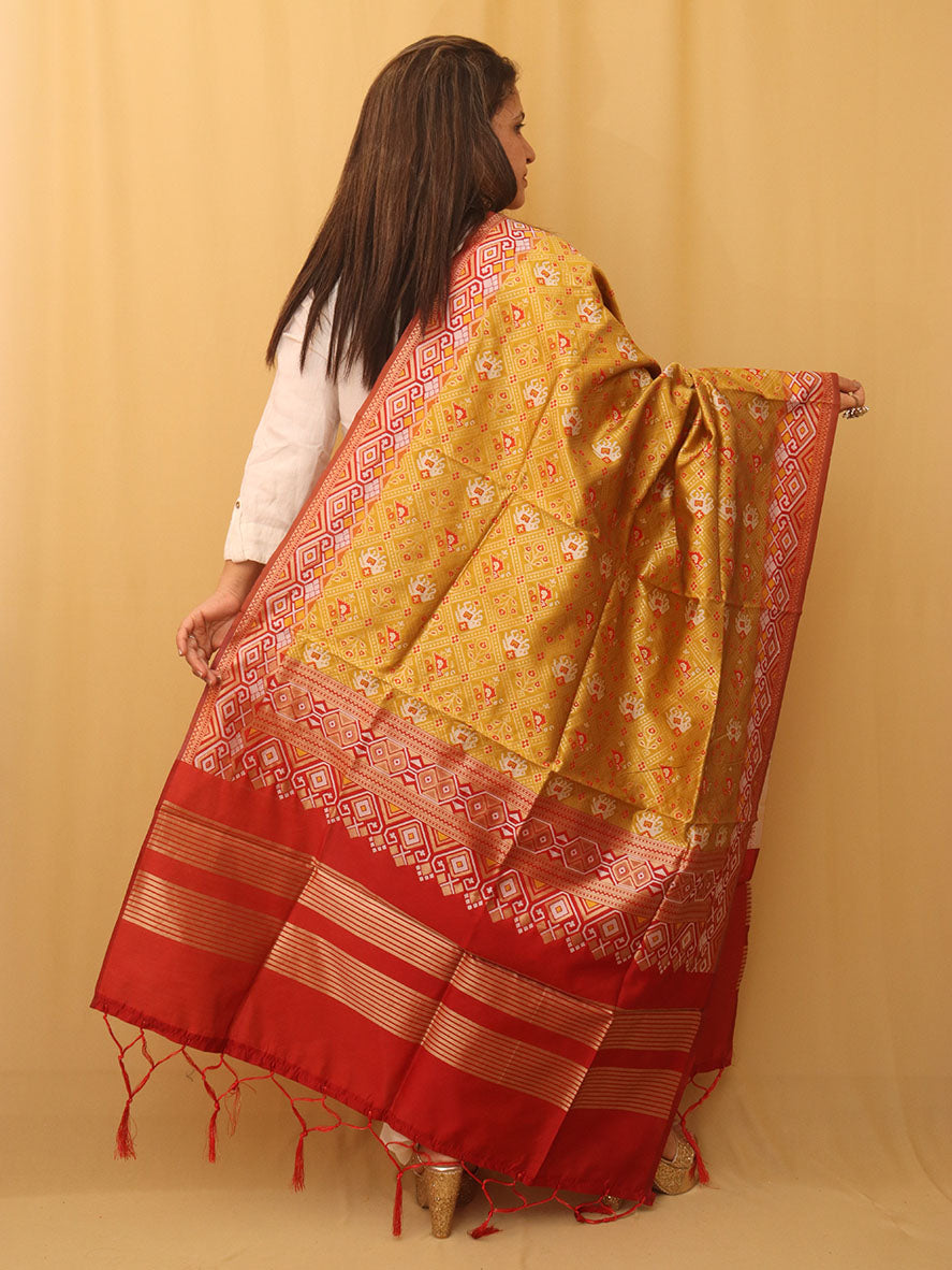 Vibrant Yellow Patola Silk Dupatta with Handcrafted Tassel - Luxurion World
