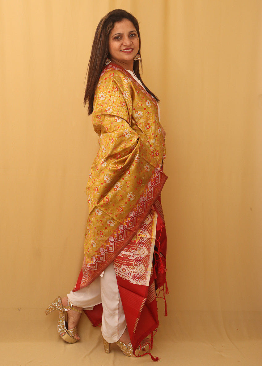 Vibrant Yellow Patola Silk Dupatta with Handcrafted Tassel - Luxurion World