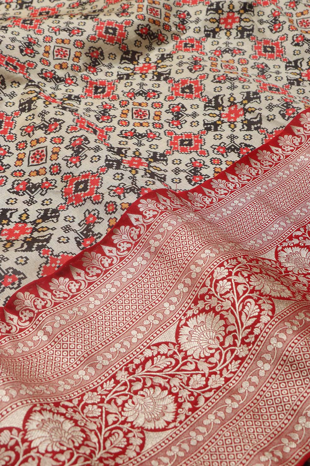 Off White Digital Printed Patola Design Tussar Silk Fabric With Banarasi Border ( 1 Mtr ) - Luxurion World