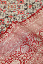 Off White Digital Printed Patola Design Tussar Silk Fabric With Banarasi Border ( 1 Mtr ) - Luxurion World