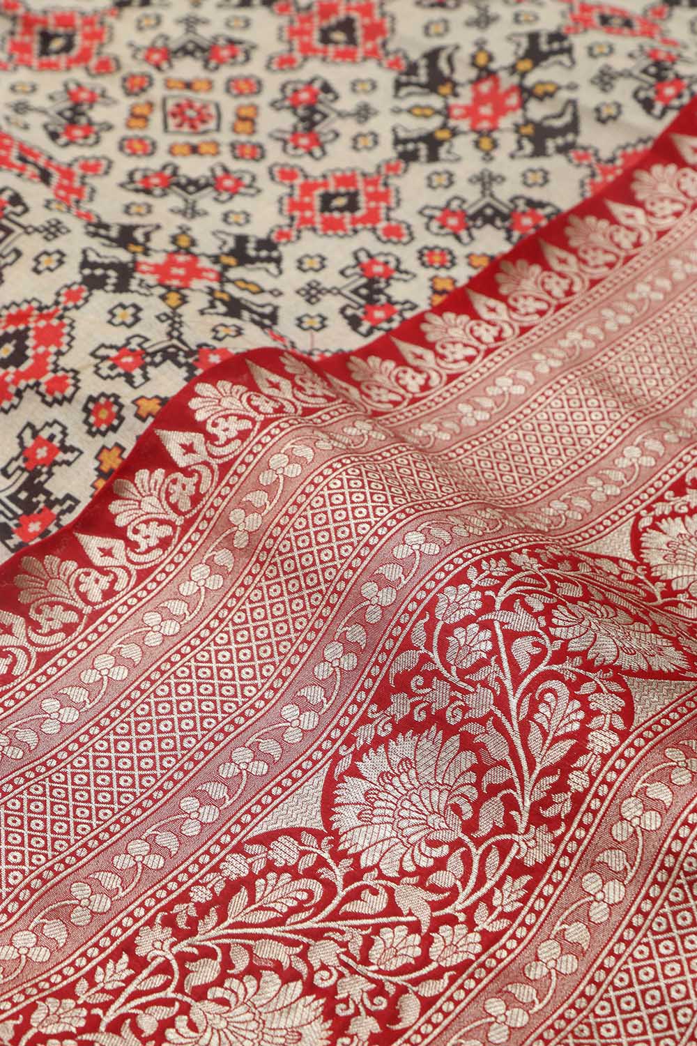 Off White Digital Printed Patola Design Tussar Silk Fabric With Banarasi Border ( 1 Mtr ) - Luxurion World