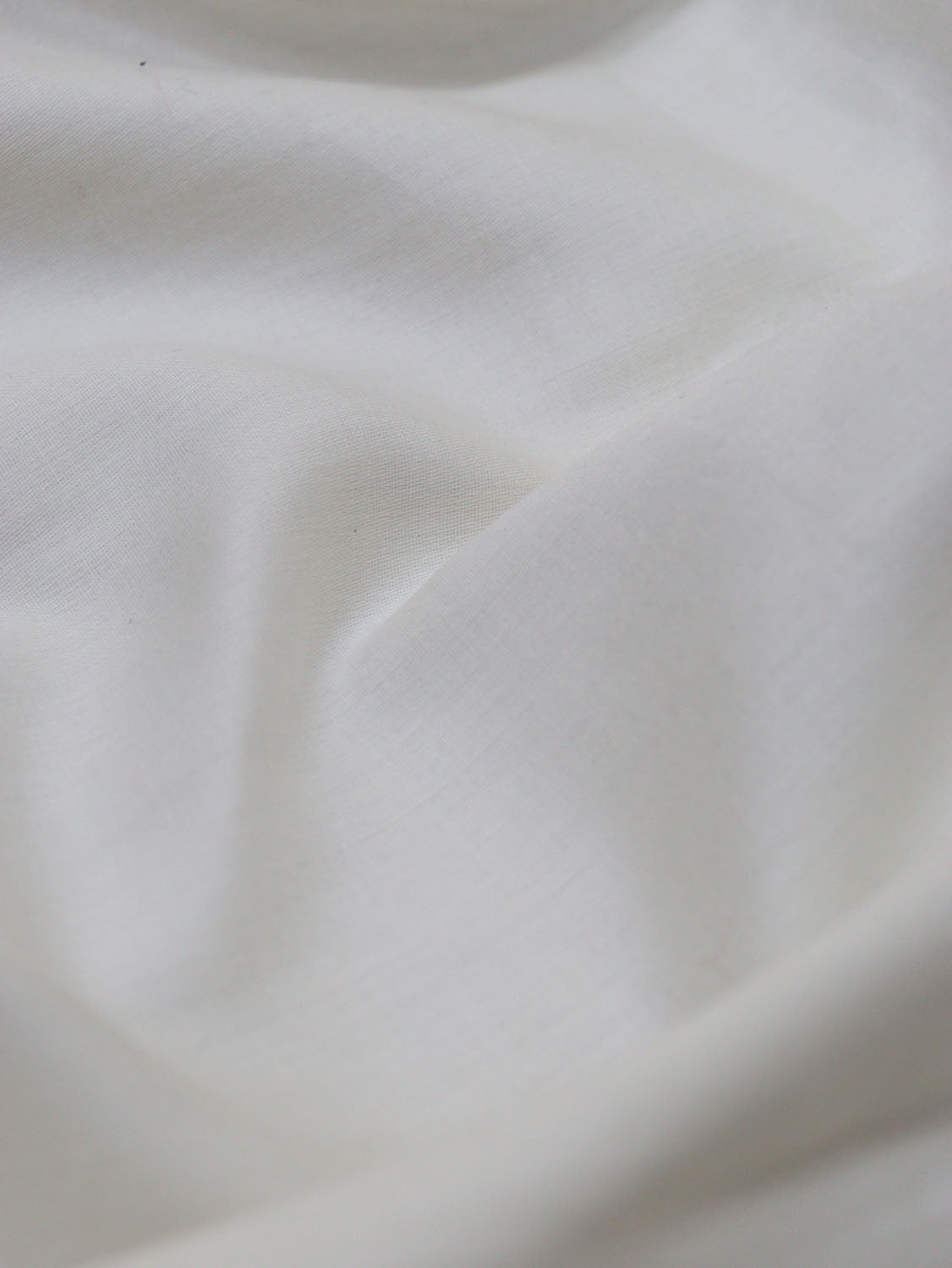 Pure Comfort: Off White Cotton Fabric for Versatile Apparel - Luxurion World