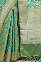 Stunning Green Banarasi Silk Saree - Elegant and Timeless - Luxurion World