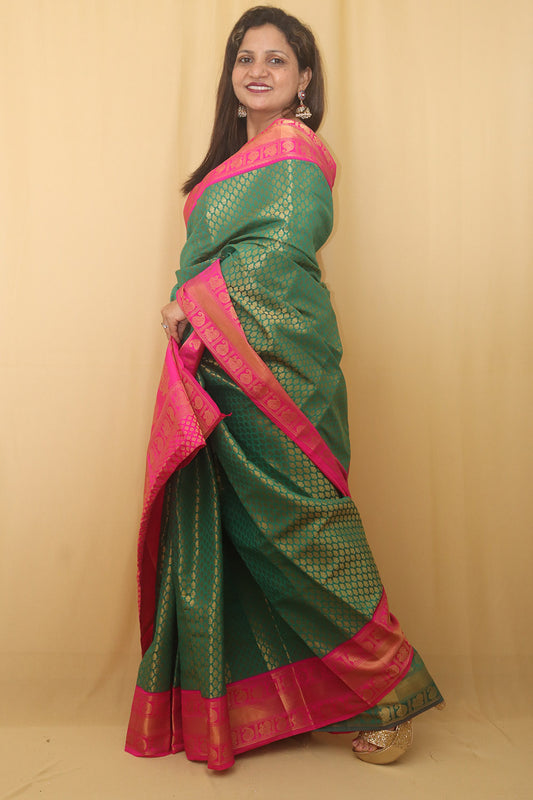 Stunning Green & Pink Kanjeevaram Silk Saree: A Perfect Blend of Elegance and Vibrancy - Luxurion World