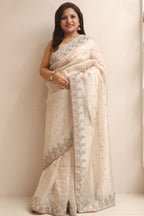 Elegant Pastel Banarasi Pure Tissue Silk Booti Design Saree With Hand Zardozi Work - Luxurion World