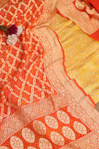 Yellow Banarasi Silk Satin Zari Brocade Suit With Orange Banarasi Bandhani Pure Georgette Dupatta - Luxurion World