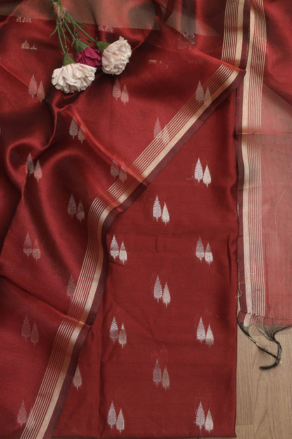Elegant Maroon Banarasi Chanderi Silk Sona Roopa Design Suit With Maroon Banarasi Plain Tissue Dupatta - Luxurion World