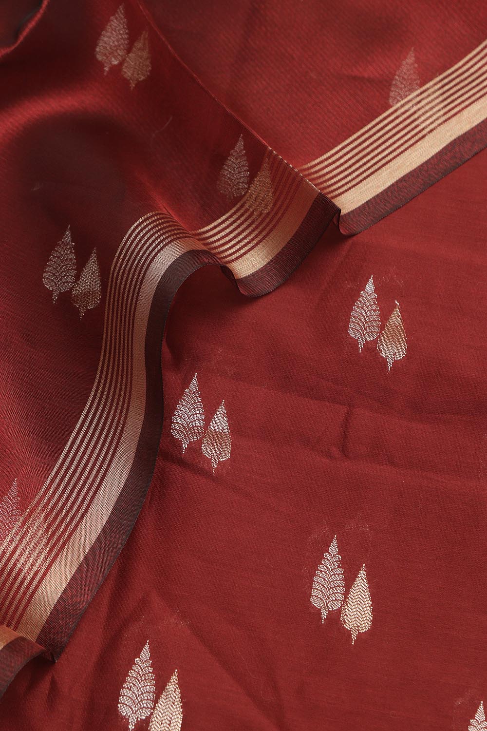 Elegant Maroon Banarasi Chanderi Silk Sona Roopa Design Suit With Maroon Banarasi Plain Tissue Dupatta - Luxurion World