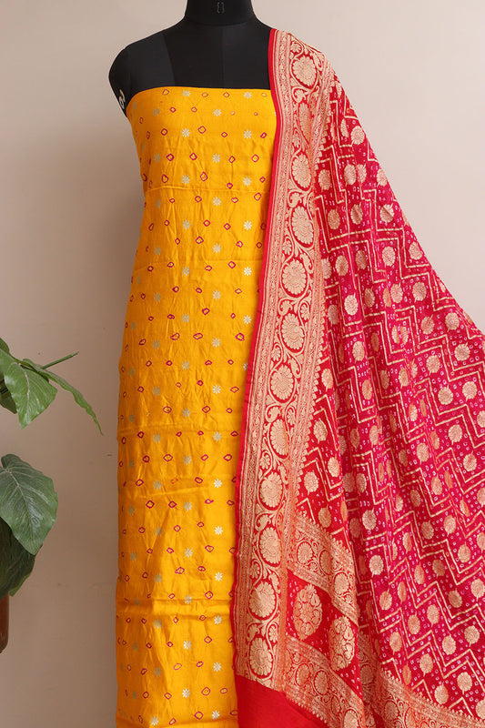 Yellow Banarasi Hand Bandhej Pure Chiniya Silk Suit With Pink Banarasi Bandhani Pure Georgette Dupatta - Luxurion World