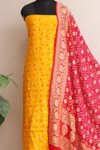 Yellow Banarasi Hand Bandhej Pure Chiniya Silk Suit With Pink Banarasi Bandhani Pure Georgette Dupatta - Luxurion World