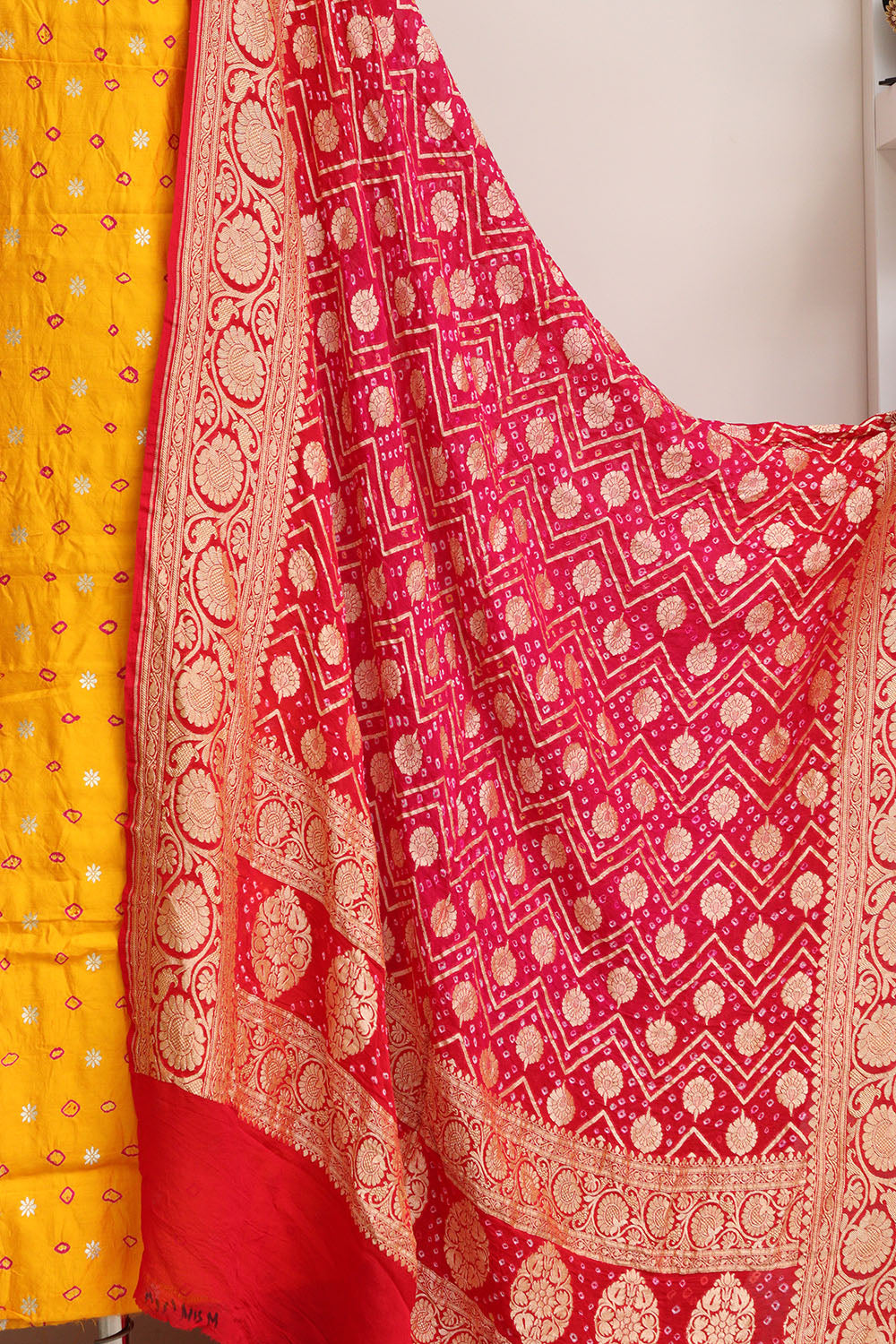 Yellow Banarasi Hand Bandhej Pure Chiniya Silk Suit With Pink Banarasi Bandhani Pure Georgette Dupatta - Luxurion World