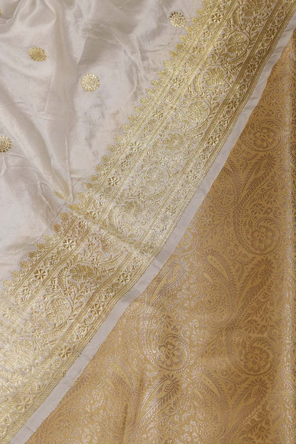 Golden Banarasi Silk Soft Brocade Flower Design Suit With White Handloom Banarasi Pure Katan Silk Dupatta