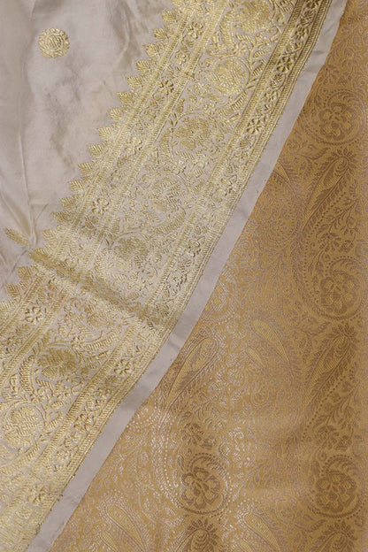 Golden Banarasi Silk Soft Brocade Flower Design Suit With White Handloom Banarasi Pure Katan Silk Dupatta