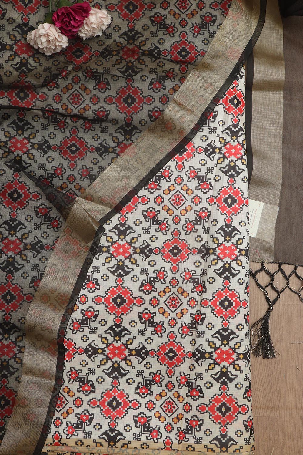 Elegant Off White Patola Design Tussar Silk Suit With Black Banarasi Tissue Dupatta - Luxurion World