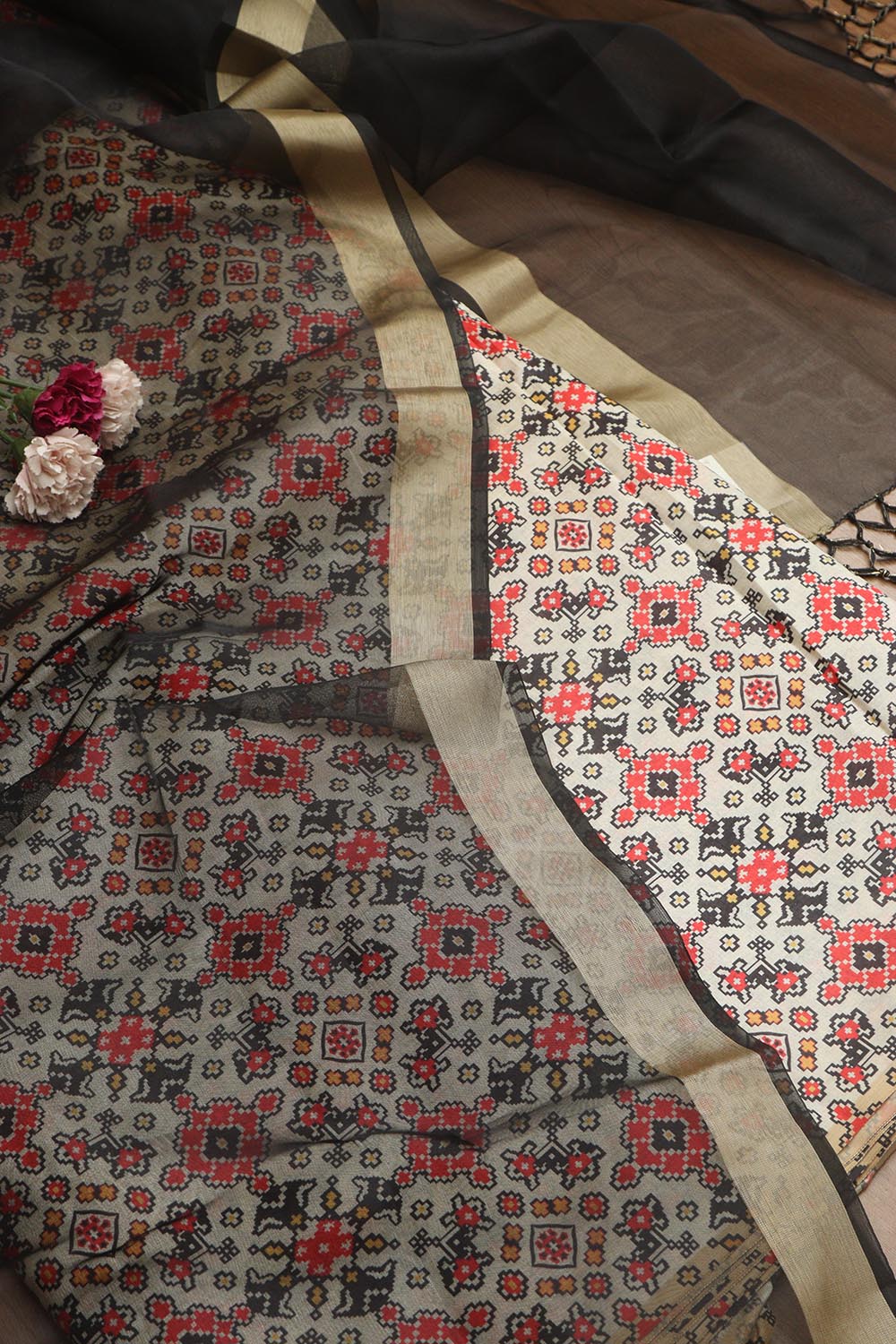 Elegant Off White Patola Design Tussar Silk Suit With Black Banarasi Tissue Dupatta - Luxurion World