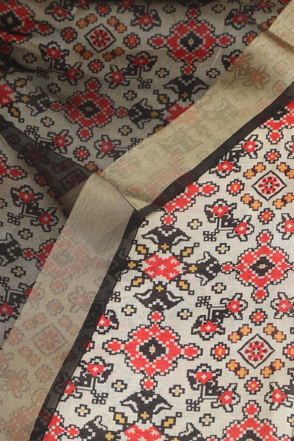 Elegant Off White Patola Design Tussar Silk Suit With Black Banarasi Tissue Dupatta - Luxurion World