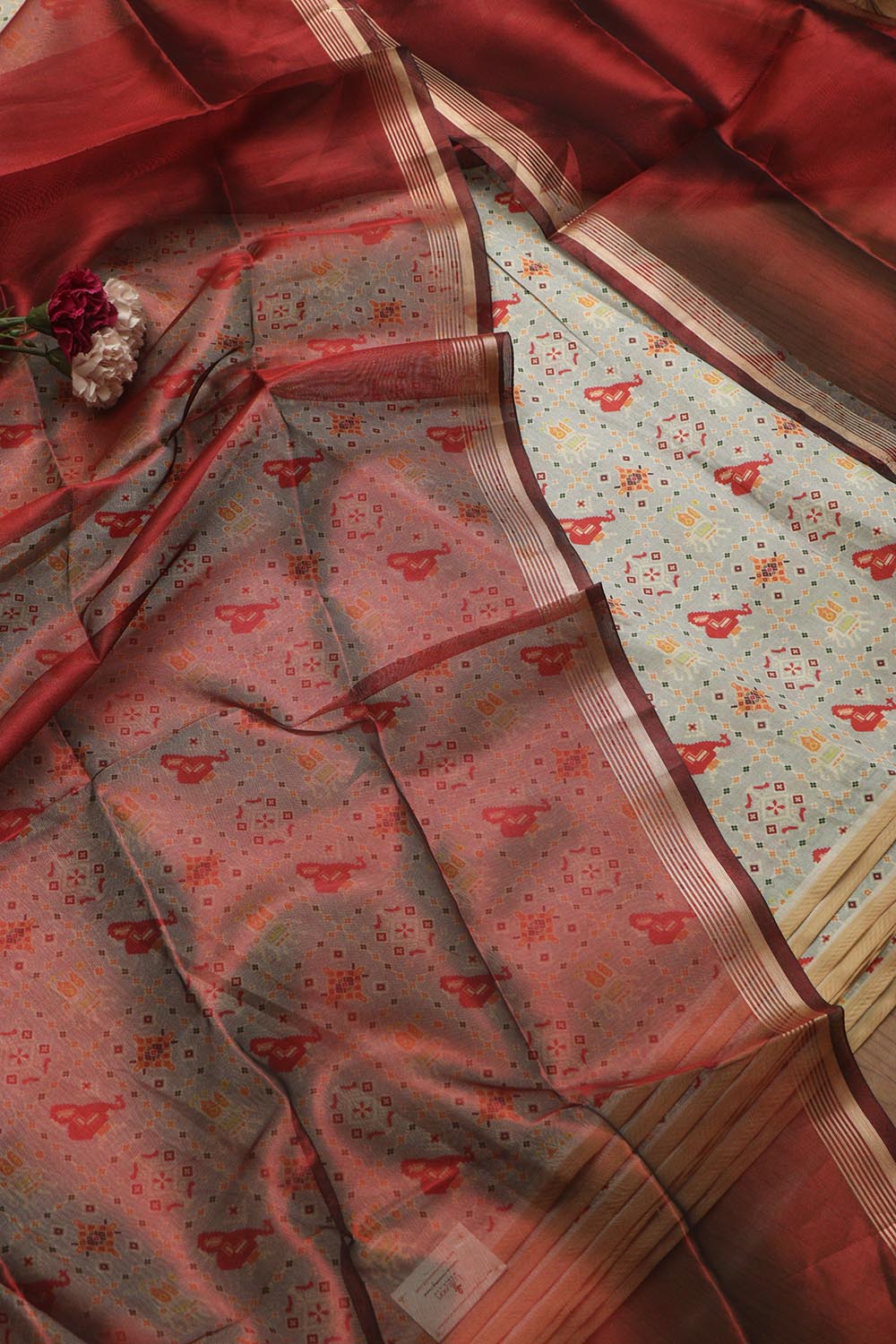 Elegant Grey Patola Design Tussar Silk Suit With Maroon Banarasi Tissue Dupatta - Luxurion World