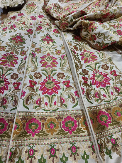 Stunning Off White Banarasi Silk Unstitched Meenakari Lehenga Set - Luxurion World