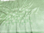 Exquisite Green Banarasi Handloom Silk Saree with Silver Zari - Luxurion World