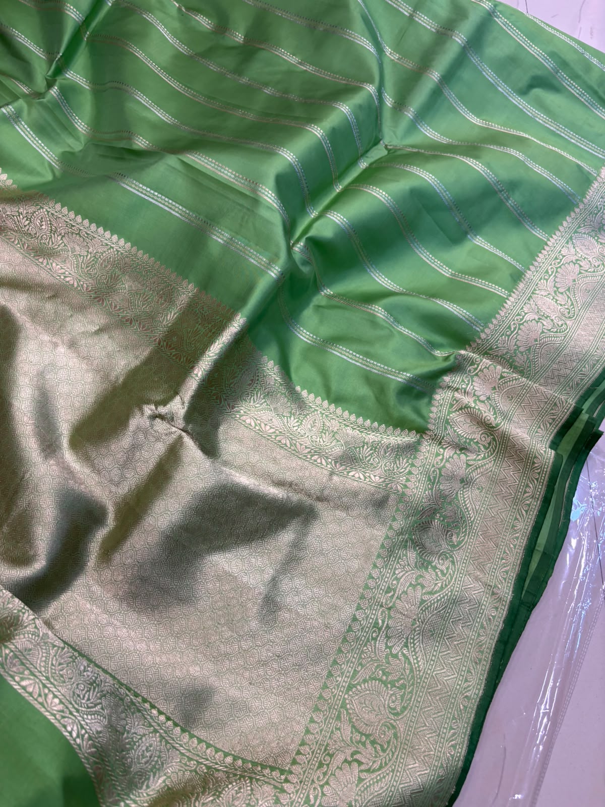 PS1B1MI626061603 Green Banarasi Tissue Silk Stripe Design Saree