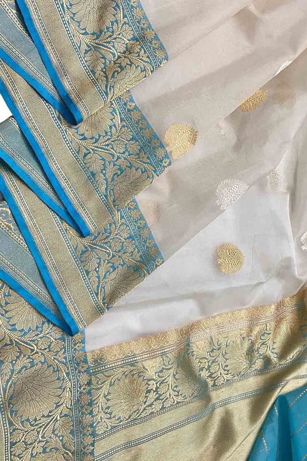 Elegant Off White Banarasi Kora Silk Saree - Luxurion World