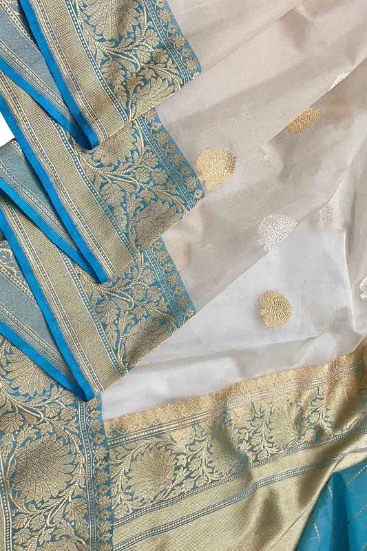Elegant Off White Banarasi Kora Silk Saree - Luxurion World