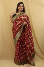 Maroon Bandhani Gharchola Madhurai Cotton Baraat Design Border Saree - Luxurion World