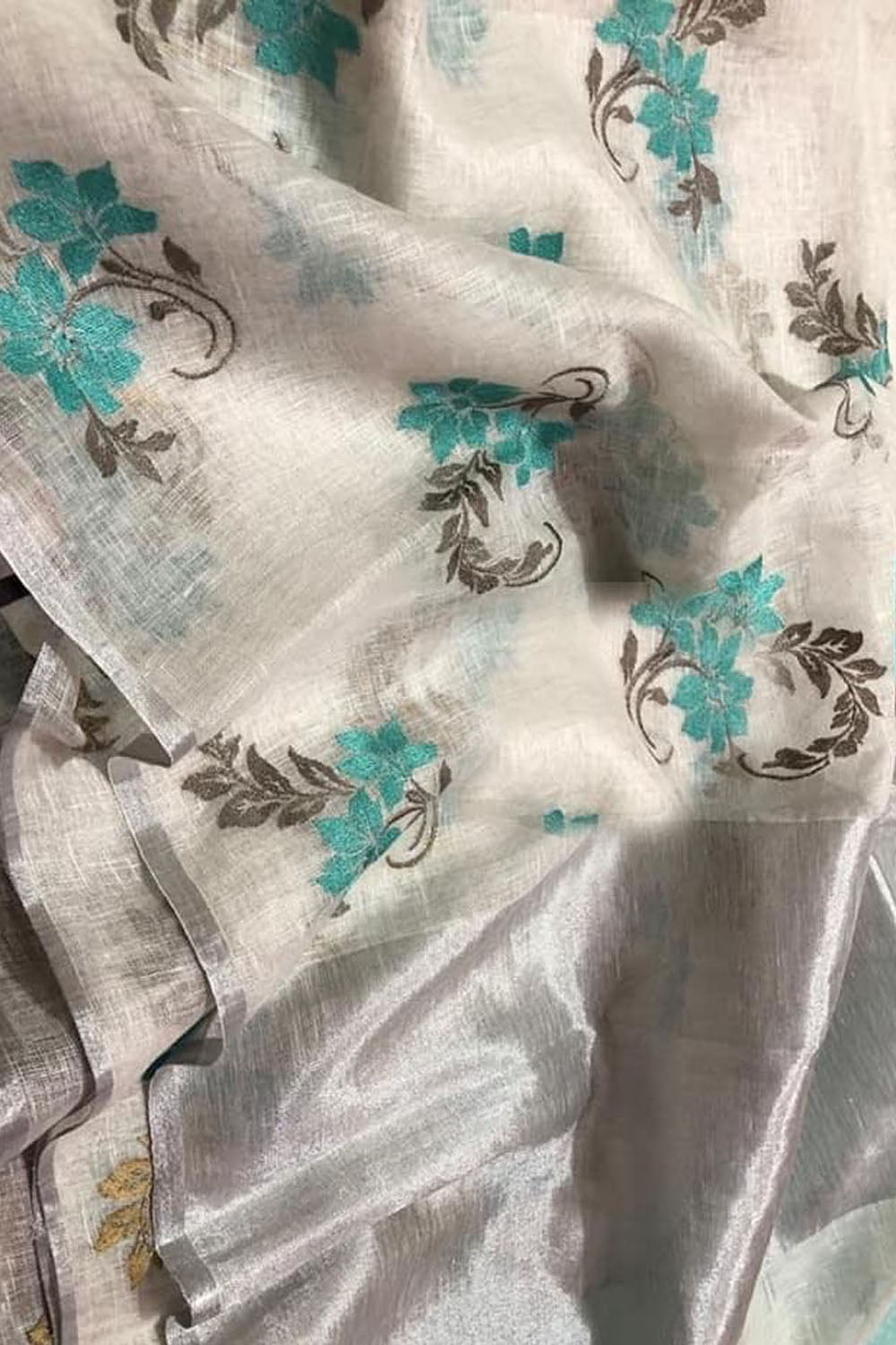 Stunning Off White Linen Saree with Intricate Embroidery - Luxurion World
