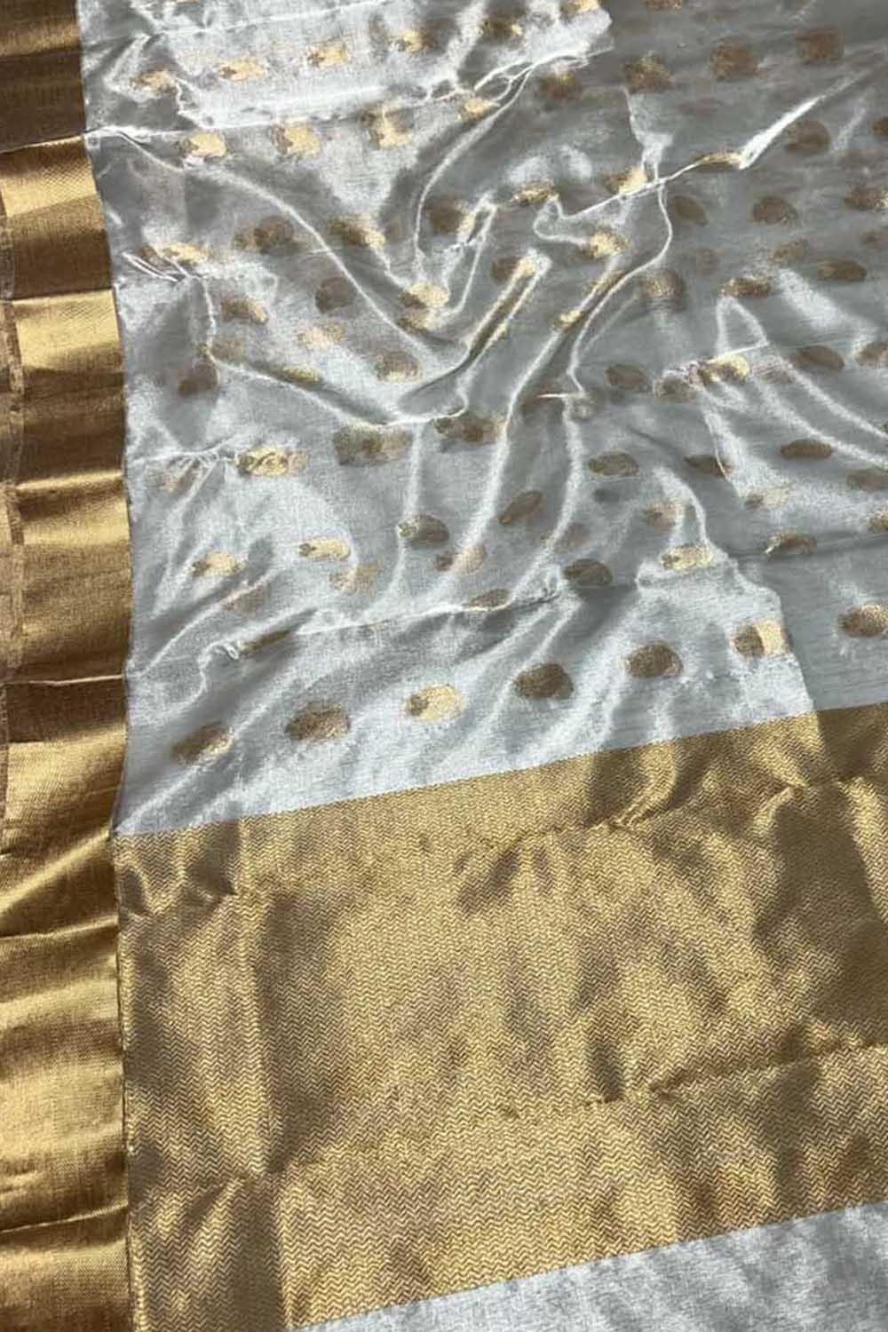 Exquisite Off White And Golden Chanderi Handloom Pure Tissue Silk Saree - Luxurion World