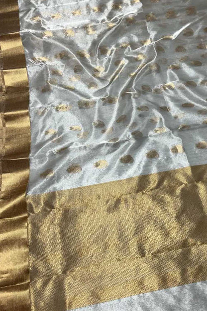 Exquisite Off White And Golden Chanderi Handloom Pure Tissue Silk Saree - Luxurion World