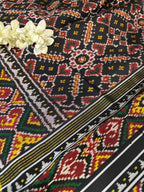 Exquisite Black Semi Patan Patola Handloom Pure Silk Saree - Luxurion World