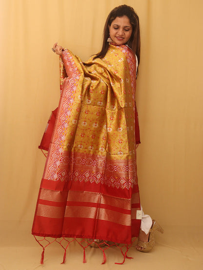 Vibrant Yellow Patola Silk Dupatta with Handcrafted Tassel - Luxurion World