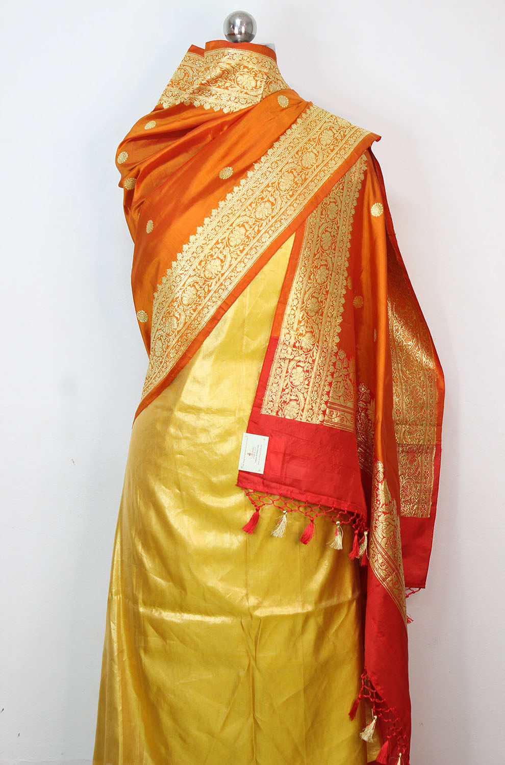 Yellow Plain Soft Tissue Katan Silk Suit With Orange Handloom Banarasi Pure Katan Silk Dupatta - Luxurion World