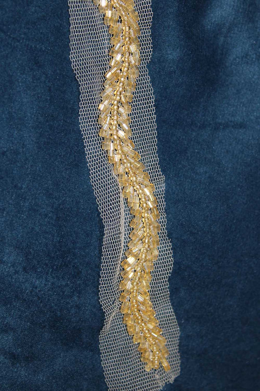 Gilded Elegance: Opulent Handcrafted Lace with Golden Embellishments - Luxurion World