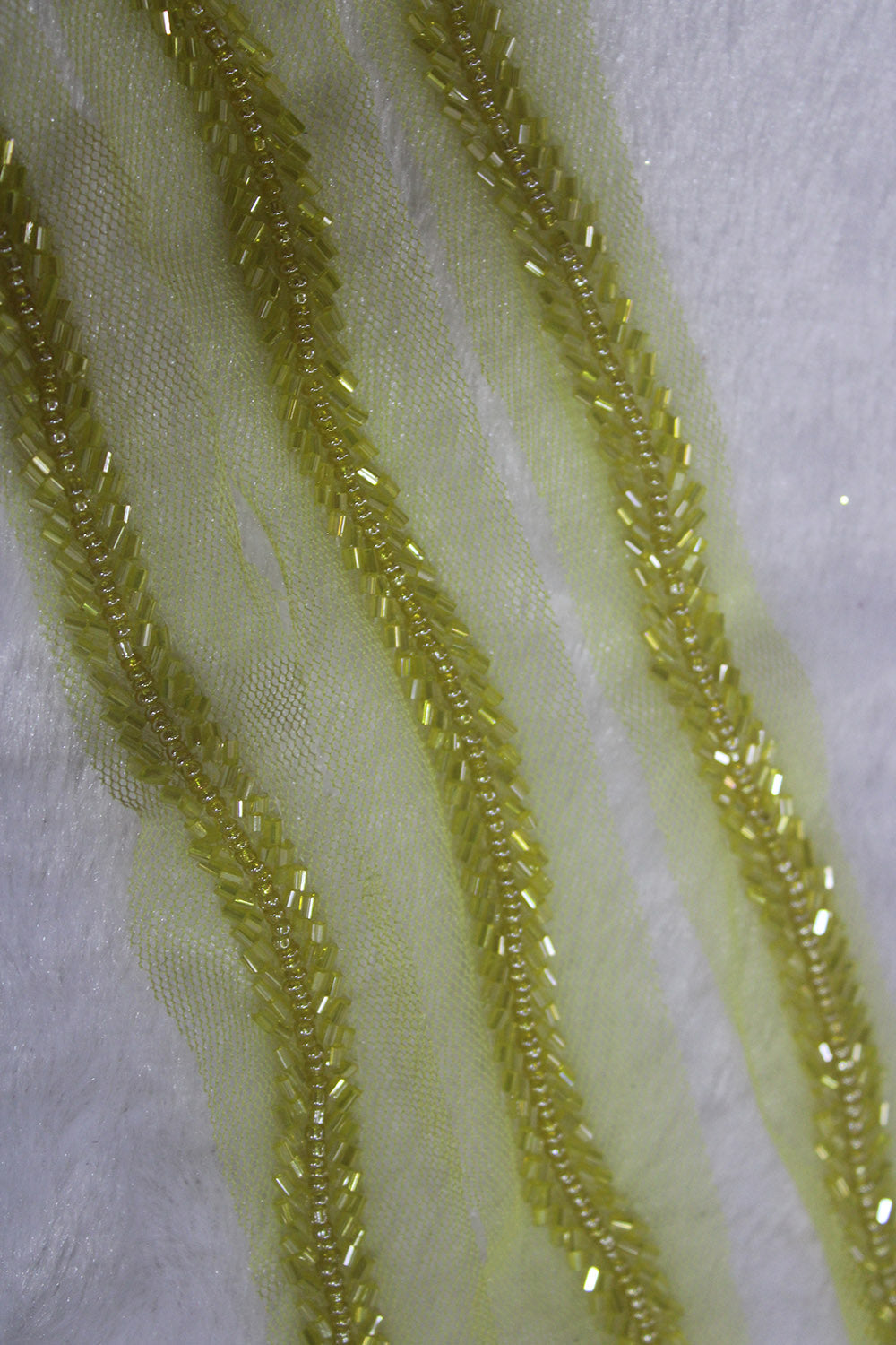 Exquisite Green Handwork Lace: Intricate Embellishments for a Stunning Look - Luxurion World