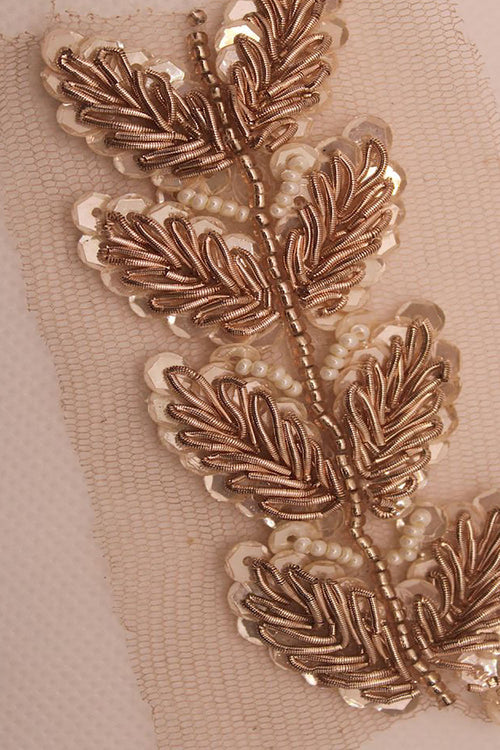 Gilded Elegance: Opulent Handcrafted Lace with Golden Embellishments - Luxurion World