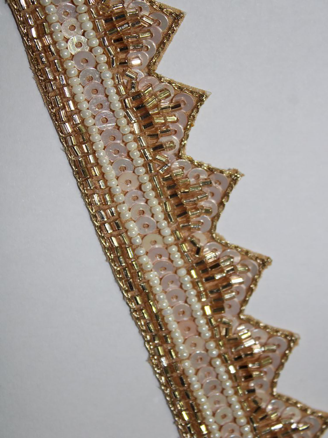 Gilded Elegance: Opulent Handcrafted Lace with Golden Embellishments - Luxurion World