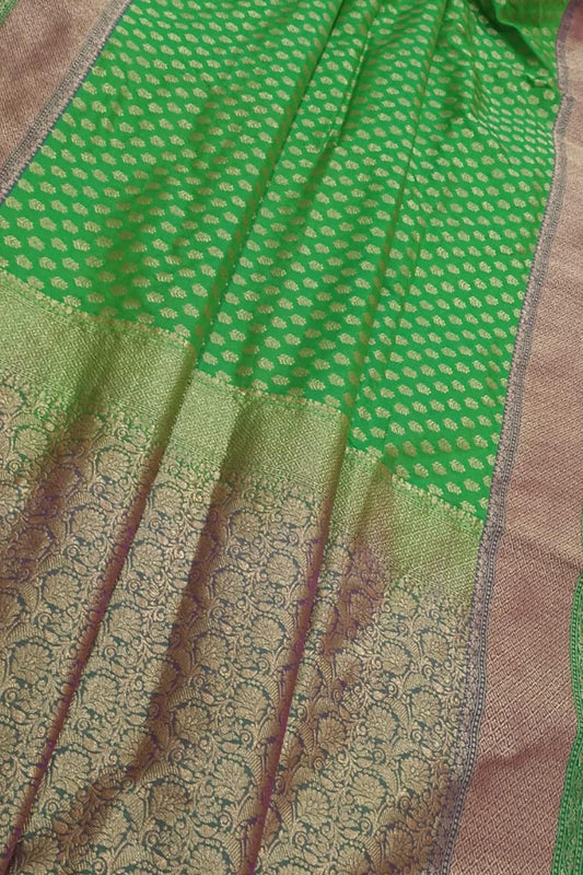 Exquisite Green Banarasi Silk Saree: Timeless Elegance and Grace - Luxurion World