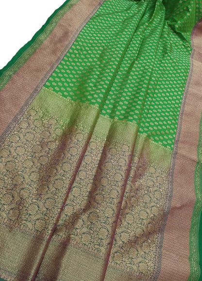 Exquisite Green Banarasi Silk Saree: Timeless Elegance and Grace - Luxurion World