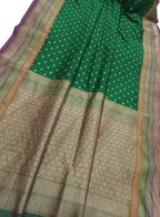 Exquisite Green Banarasi Silk Saree: Timeless Elegance and Grace - Luxurion World