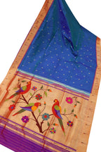 Exquisite Blue Paithani Silk Parrot Design Saree with Muniya Border: Handloom Elegance - Luxurion World