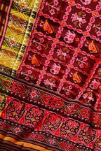 Elegant Maroon Patola Handloom Silk Saree: A Timeless Classic - Luxurion World