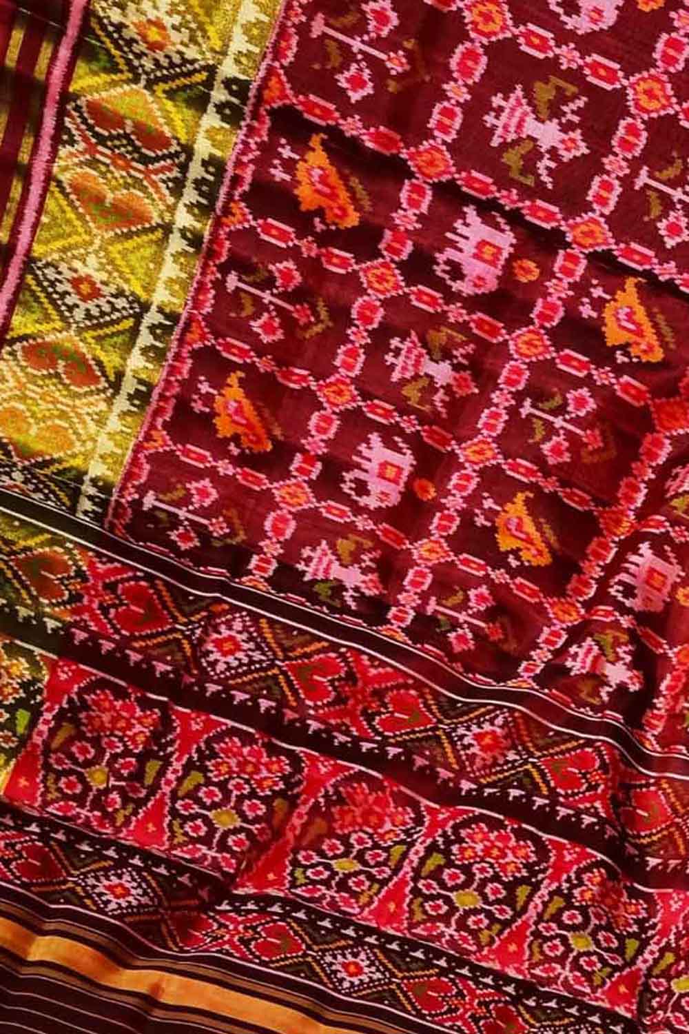 Elegant Maroon Patola Handloom Silk Saree: A Timeless Classic - Luxurion World