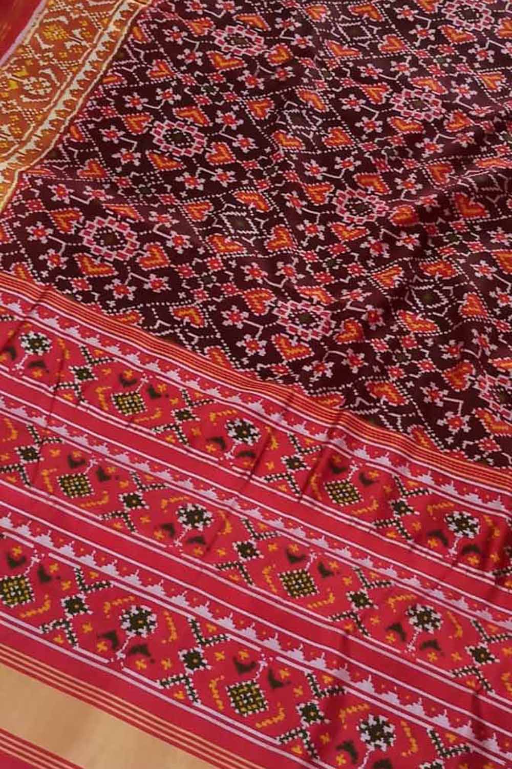Elegant Maroon Patola Handloom Silk Saree: A Timeless Classic - Luxurion World