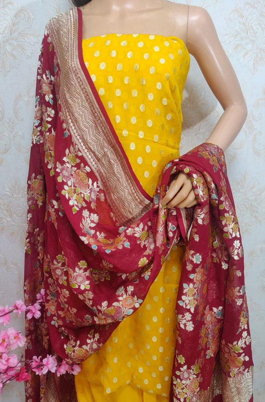 Yellow Handloom Banarasi Pure Georgette Three Piece Unstitched Suit Set With Brush Dye Dupatta - Luxurion World