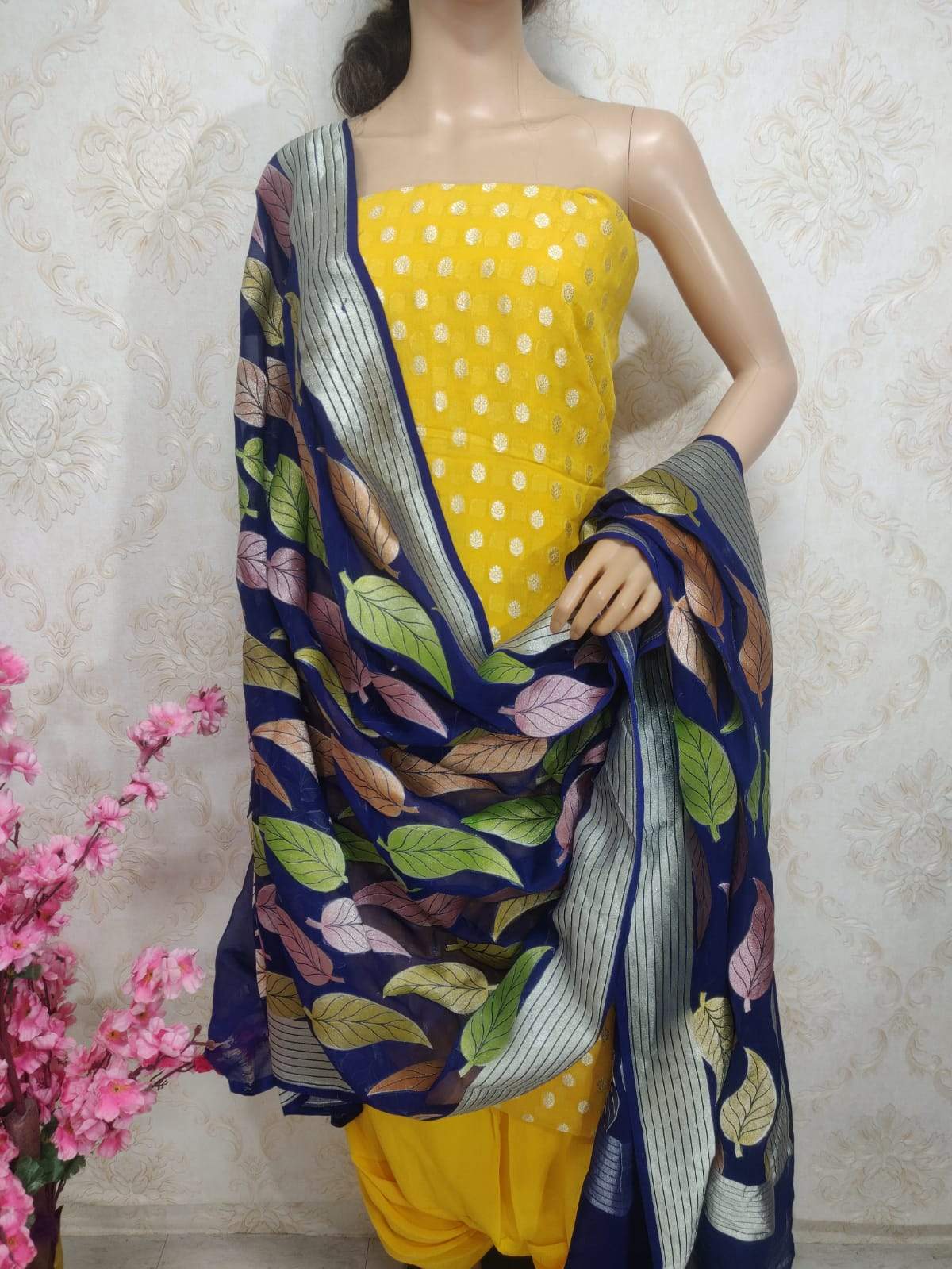 Yellow Handloom Banarasi Pure Georgette Three Piece Unstitched Suit Set With Brush Dye Dupatta