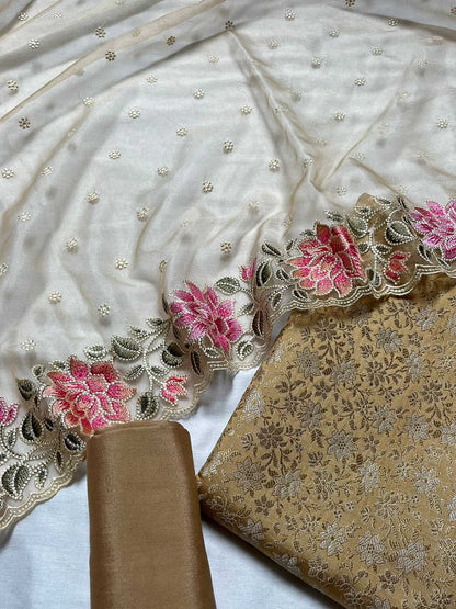Cream Banarasi Katan Silk Three Piece Unstitched Suit Set With Embroidered Organza Dupatta