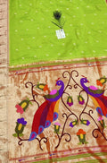 Green Handloom Paithani Pure Silk Muniya Border Peacock And Floral Design Saree - Luxurion World